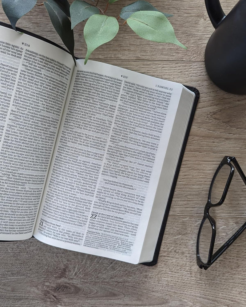 Holy Bible: New Living Translation, Trinity Cross Black  by Tyndale