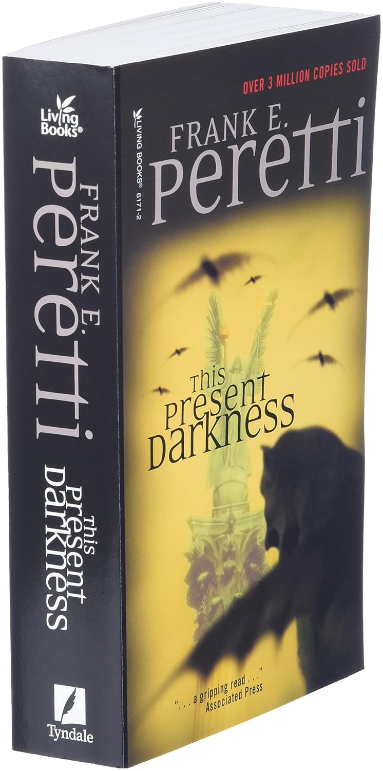 This Present Darkness by Frank E. Peretti