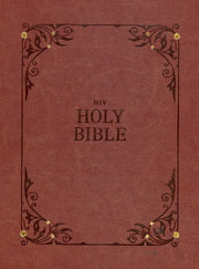 Brown leather-bound Bible with decorative corners and gold rivets