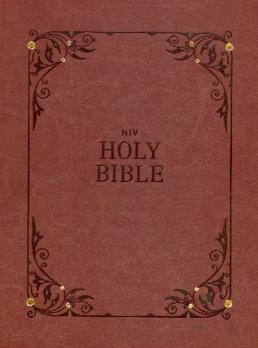 Brown leather-bound Bible with decorative corners and gold rivets