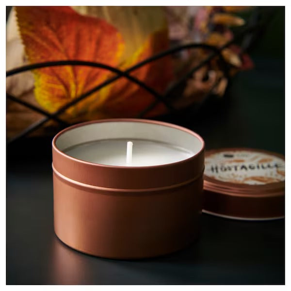 IKEA Hostagille scented candle in metal tin sandalwood patchouli copper colour